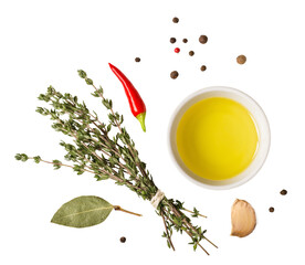 Olive oil, bouquet of thyme and spices cut out on transparent background