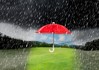 Red umbrella in the rainy sky