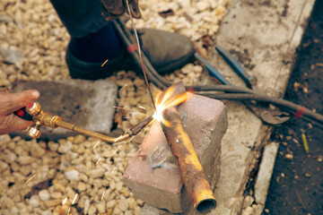 Obraz premium Gas welding of metal at the construction site.