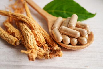 Ginseng roots and green leaf, healthy food.