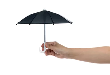 Fotobehang Human hand holding a small umbrella © xy
