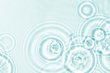 Abstract water, cosmetic background with rings, water surface. Spa concept background. Splash...