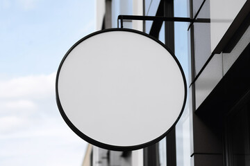 Blank white minimal circular shop signboard mockup. Created with Generative AI Technology
