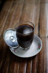 a traditional Indonesian cup of coffee named kopi klotok