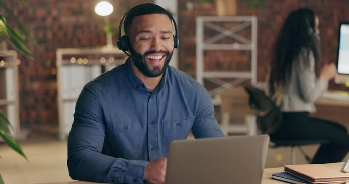 Contact us, communication or black man in call center explaining, helping or talking in telecom at night. Friendly consultant, laptop or telemarketing sales agent speaking online in customer services