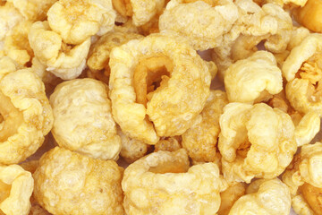 Pork rinds or Pork snack, deep fried pork skin crispy and blistered, Thailand food.