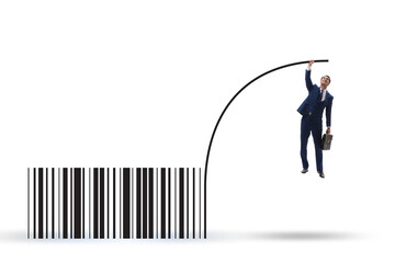 Businessman jumping over bar code in pole vaulting