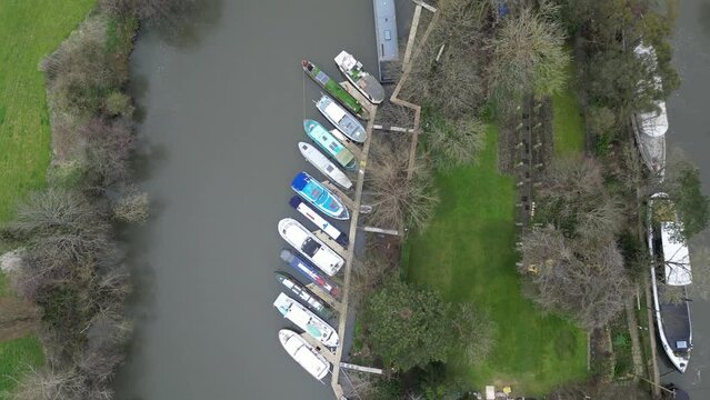 Overhead Drone overhead birds eye view boats moored  walton on Thames UK