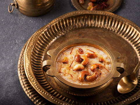 Famous Indian dessert kheer or semiya payasam topped with dry fruits and nuts