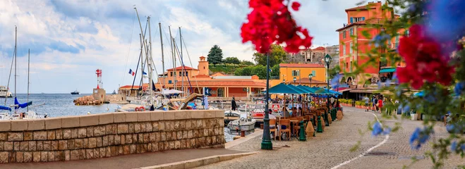 Fotobehang Nice Colorful restaurants by Mediterranean Sea, Villefranche sur Mer, South of France