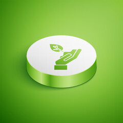 Isometric Plant in hand of environmental protection icon isolated on green background. Seed and seedling. Planting sapling. White circle button. Vector