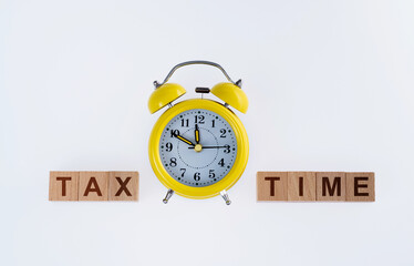 Tax time blocks with alarm clock