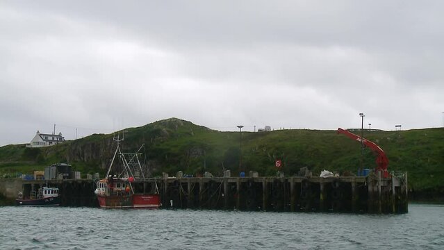 A shot of the dock in Scalpay. Filmed on the Isle of Scalpay near the Isle of Harris, part of the Outer Hebrides of Scotland.