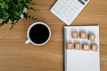 Blocks with tax time on office table