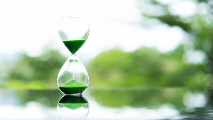 Glass hourglass is in nature