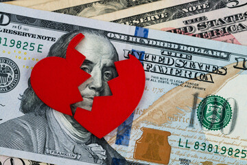 Broken heart on USA paper currency
