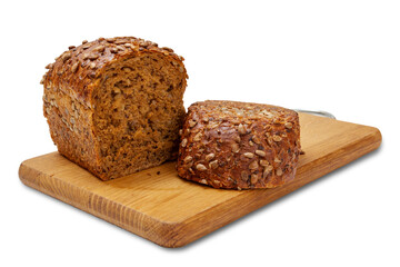 Cut loaf of bread on wooden cutting board on white isolated background