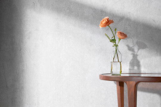 A cozy home with sunlight shining through the
windows and fresh flowers