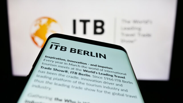 Stuttgart, Germany - 03-19-2023: Mobile phone with website of German tourism trade fair ITB Berlin on screen in front of logo. Focus on top-left of phone display.