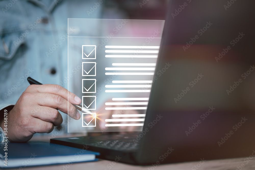 Poster Business performance checklist concept, businessman using laptop doing online checklist survey, filling out digital form checklist. Business performance monitoring concept, digital form checklist.