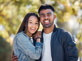 Couple, outdoor and portrait with a smile for love, care and happiness together in summer. Young man and woman at nature park for affection or hug on a happy and romantic date or vacation to relax