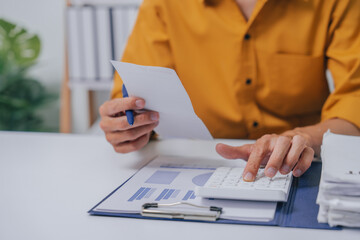 Young Serious asia people bookkeeper doing bookkeeping entrepreneur small business owner accountant...
