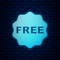 Glowing neon Price tag with an inscription Free icon isolated on brick wall background. Badge for price. Promo tag discount. Vector