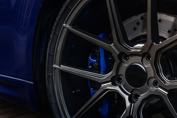 Fototapeta na wymiar Close up of Sport Car Wheel