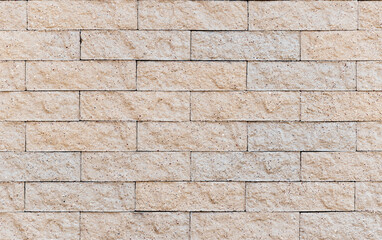 Cream color wall with pattern line  brick interior background