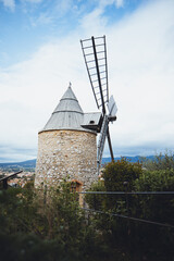 windmill in the village - 584181924