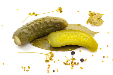 Pickled cucumbers with seasoning on a white isolated background