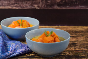 Kolak Ubi, Indonesian dessert. Sweet potato cooked with coconut milk, palm sugar and pandanus leaves. very popular during Ramadhan. Iftar meal