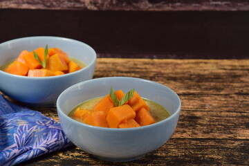 Kolak Ubi, Indonesian dessert. Sweet potato cooked with coconut milk, palm sugar and pandanus leaves. very popular during Ramadhan. Iftar meal