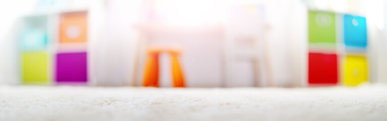 Blurred background of the colourful child room.