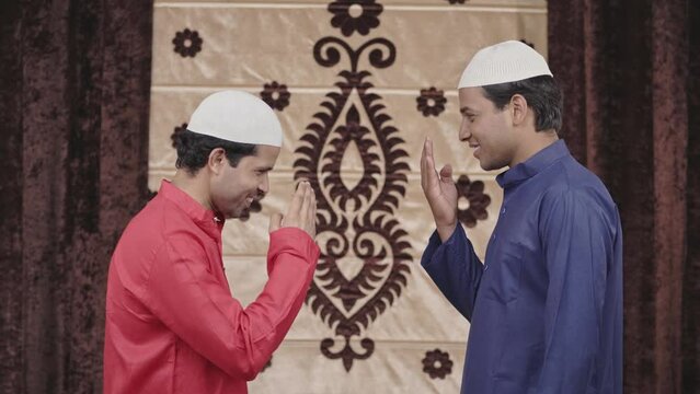 Muslim men greeting by doing Adaab