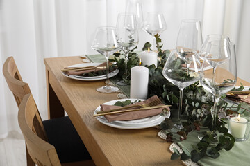 Stylish elegant table setting for festive dinner indoors