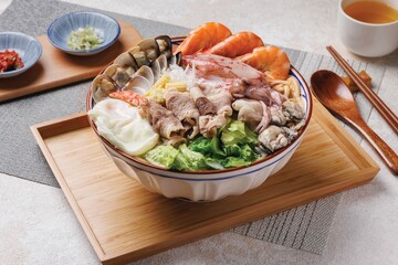 Mixed Seafood Contain Blue Crabs, Mussels, Big Shrimps, Calamari Squids and Grilled Barracuda Fish Garlic with Lemon on Dish