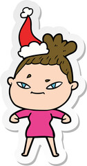 sticker cartoon of a woman wearing santa hat