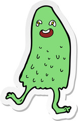 sticker of a cartoon funny slime monster