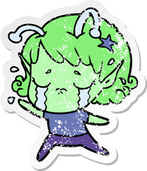 distressed sticker of a cartoon crying alien girl