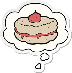 cartoon biscuit and thought bubble as a printed sticker