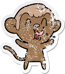 distressed sticker of a crazy cartoon monkey
