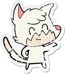 distressed sticker of a cartoon friendly fox