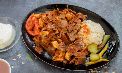 Turkish meat doner in a black plate