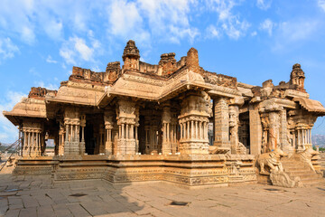 Beautiful medieval stone architecture with intricate carvings inside Vijaya Vittala temple at Hampi, Karnataka, India