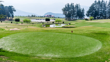 Fototapeta na wymiar Naldehra Golf Course near Shimla is very famous as the oldest golf club in India