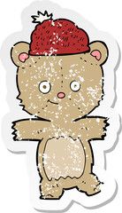 retro distressed sticker of a cartoon bear in hat