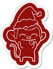 funny cartoon  sticker of a monkey wearing santa hat