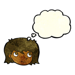 cartoon female face with thought bubble