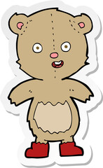 sticker of a cartoon happy teddy bear in boots